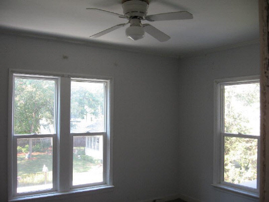 826 6th Street Rochelle, IL 61068 - Photo 7 of 10 a window in an empty room with a window