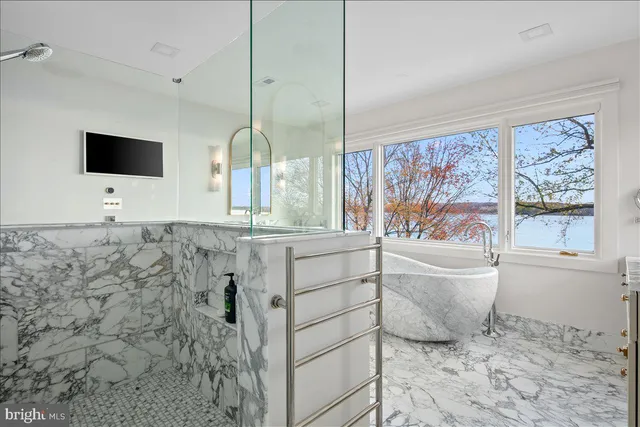 a view of wooden fence and trees around