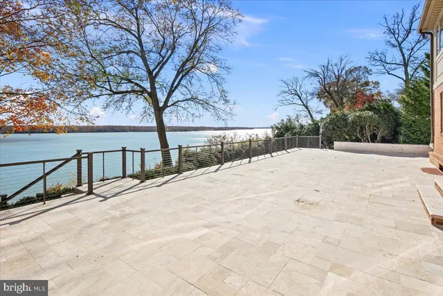 a view of snow on the side of a road