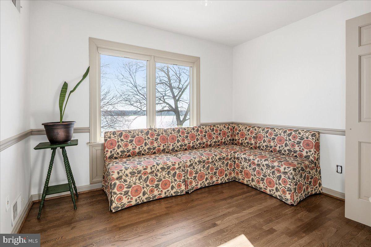 3903 Belle Rive Terrace Alexandria, VA 22309 - Photo 35 of 69 a living room with furniture and a window
