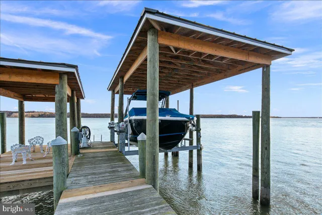 a view of living room with balcony and furniture