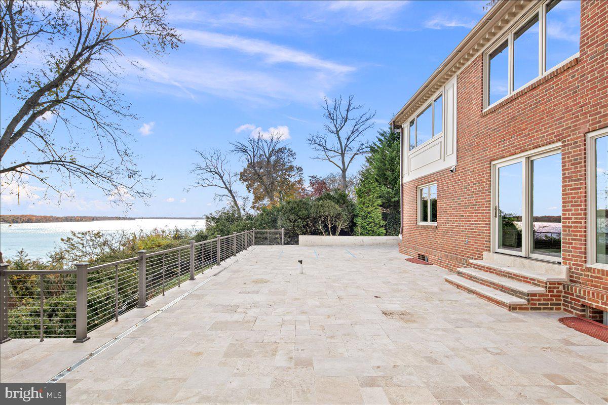 3903 Belle Rive Terrace Alexandria, VA 22309 - Photo 43 of 69 a view of a house with a snow in the yard