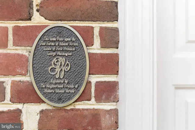 a view of a city with tall buildings and ocean view