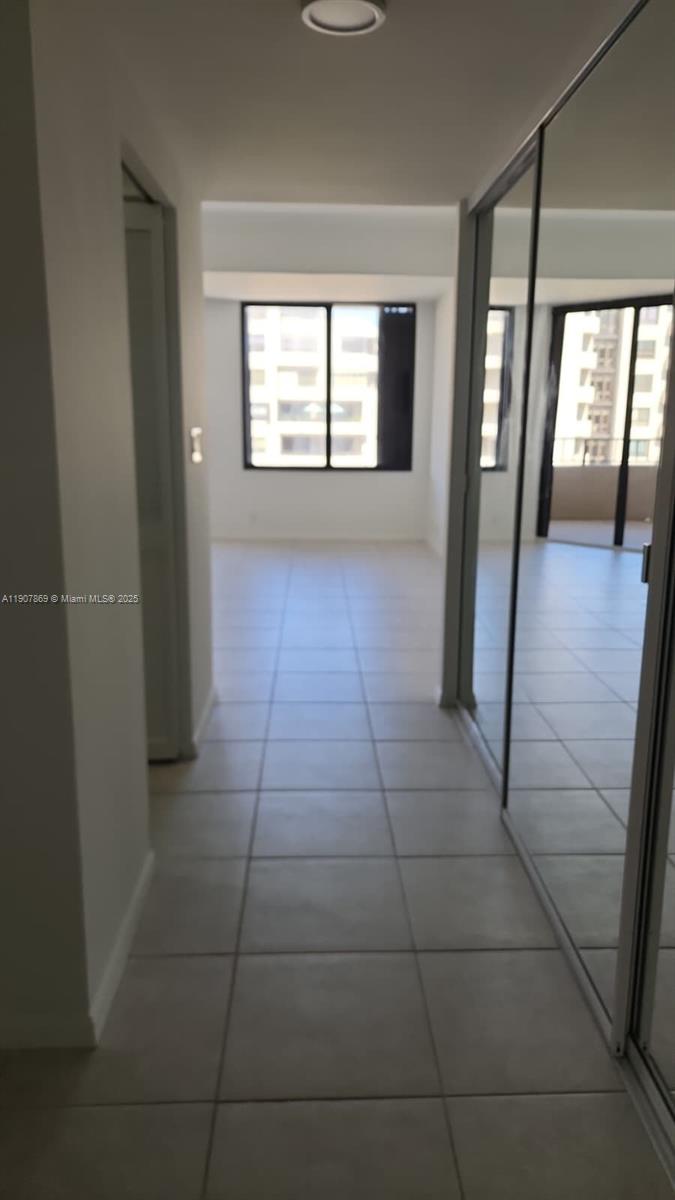 201 Crandon Boulevard, Unit 936 Key Biscayne, FL 33149 - Photo 13 of 18 a view of hallway with a window