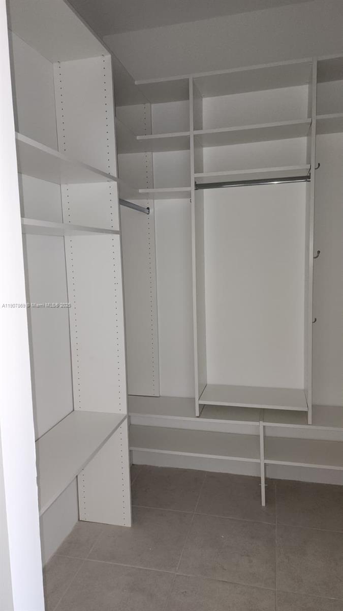 201 Crandon Boulevard, Unit 936 Key Biscayne, FL 33149 - Photo 15 of 18 a view of walk in closet