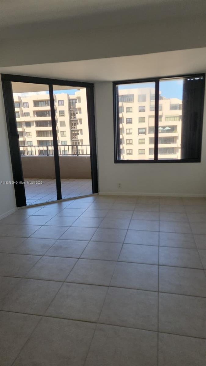 201 Crandon Boulevard, Unit 936 Key Biscayne, FL 33149 - Photo 3 of 18 a view of an empty room with a window