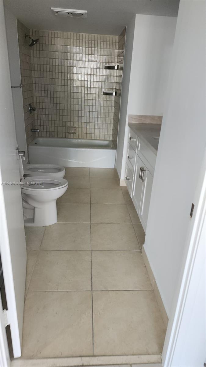 201 Crandon Boulevard, Unit 936 Key Biscayne, FL 33149 - Photo 10 of 18 a bathroom with a toilet and a shower