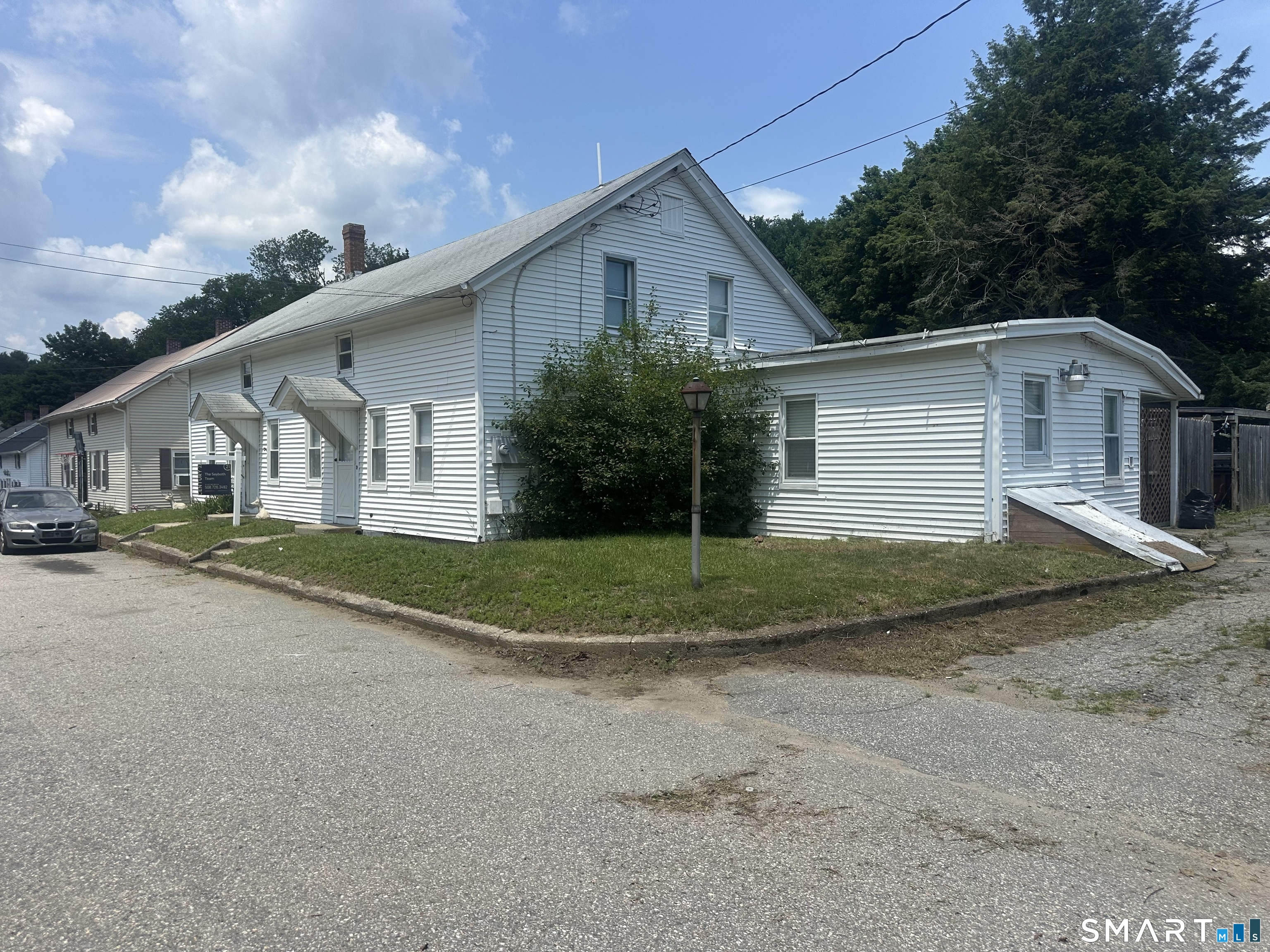 36 Church Street Killingly, CT 06241 - Photo 1 of 39 a view of a yard in front of house