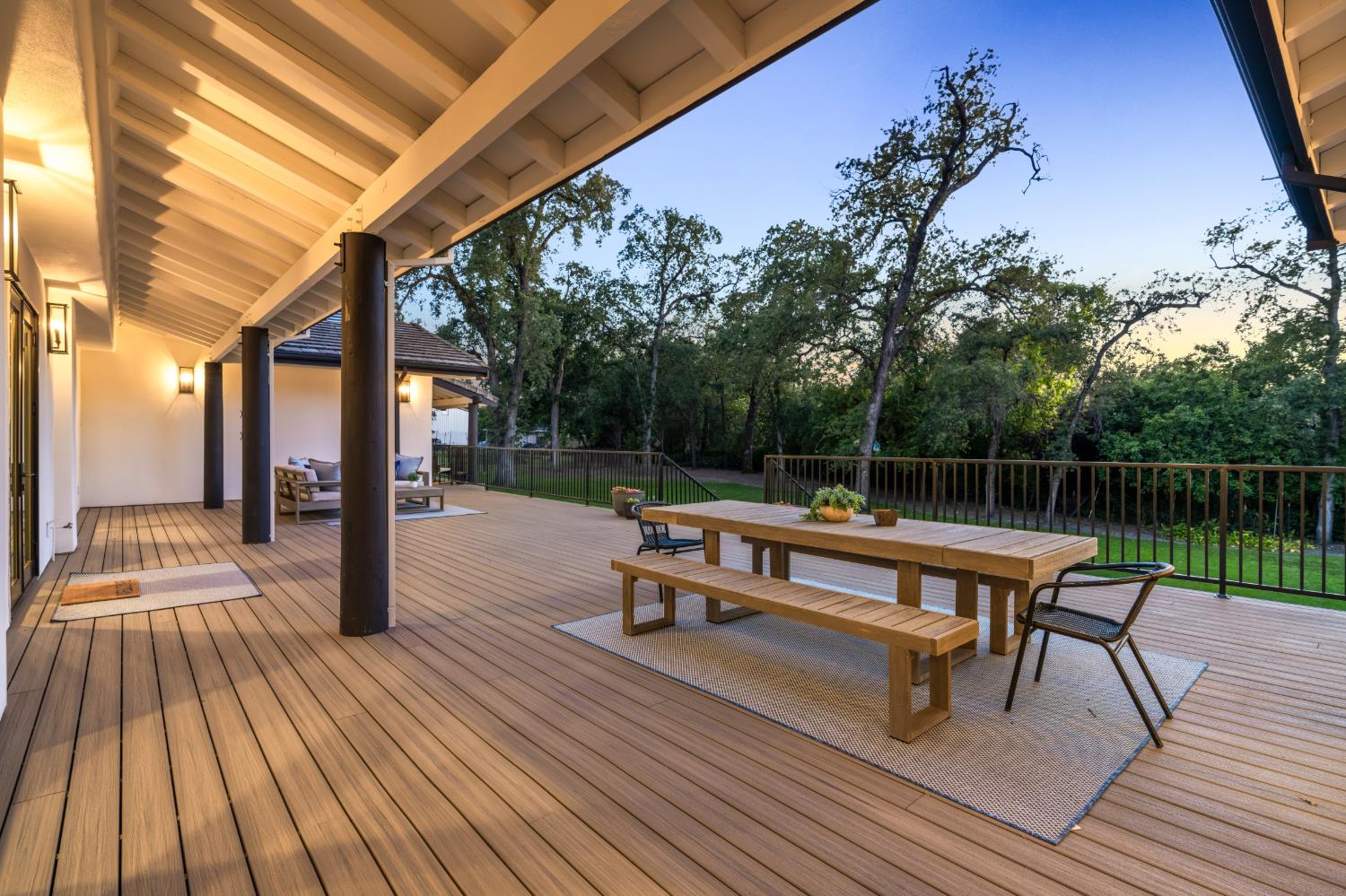 7697 Horseshoe Bar Road Loomis, CA 95650 - Photo 56 of 76 a view of a terrace with wooden floor and outdoor seating