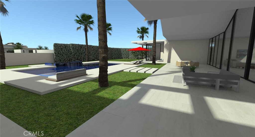 1 Makena Lane Rancho Mirage, CA 92270 - Photo 2 of 19 a living room with furniture and a floor to ceiling window