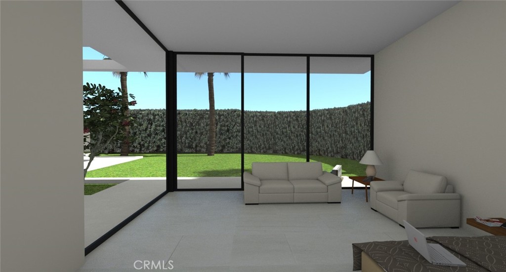 1 Makena Lane Rancho Mirage, CA 92270 - Photo 6 of 19 a living room with couch and a large window