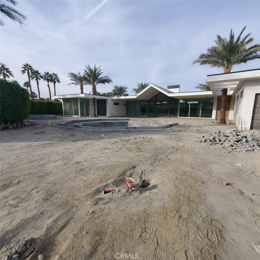 1 Makena Lane Rancho Mirage, CA 92270 - Photo 10 of 19 a view of a dry yard with a trampoline