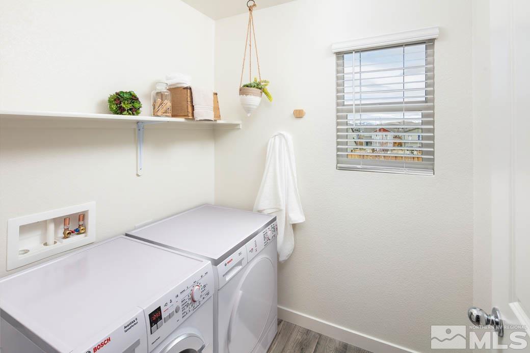 7789 Wandering Way, Unit LOT #243 Reno, NV 89506 - Photo 15 of 15 a utility room with dryer and washer