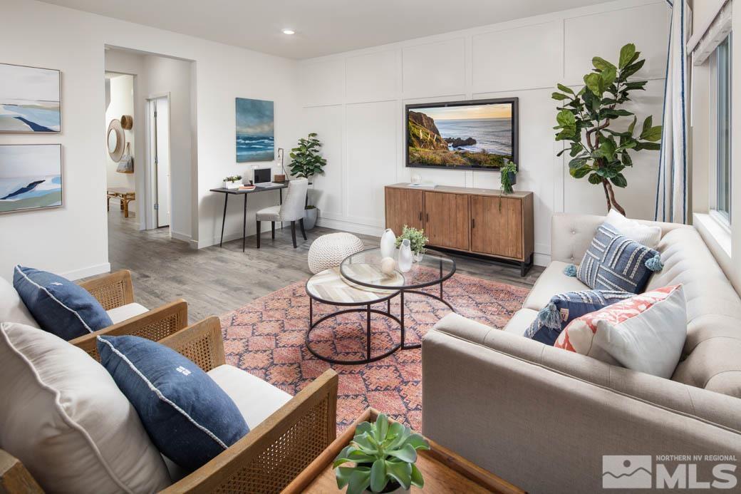 7789 Wandering Way, Unit LOT #243 Reno, NV 89506 - Photo 2 of 15 a living room with furniture and a potted plant
