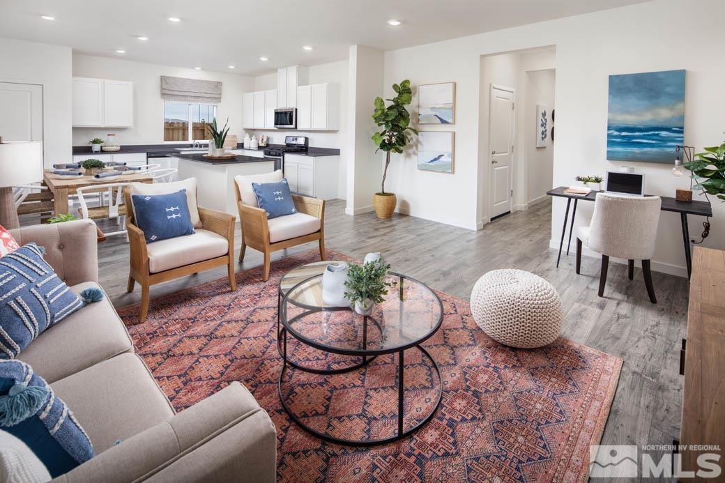 7789 Wandering Way, Unit LOT #243 Reno, NV 89506 - Photo 3 of 15 a living room with furniture and a view of kitchen