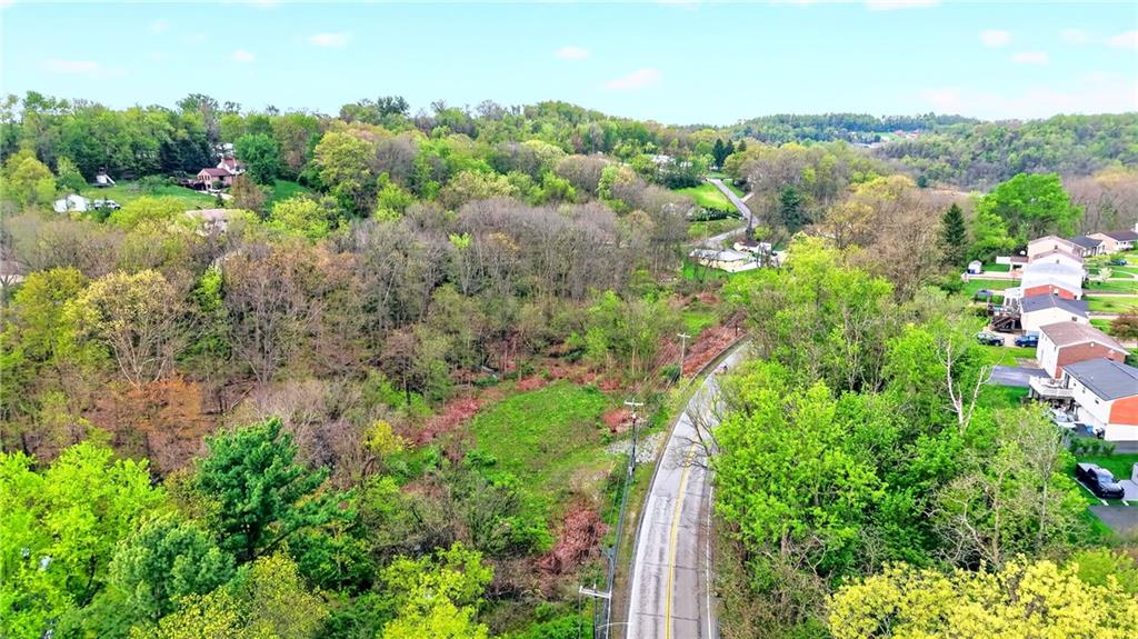 0 Clever Road McKees Rocks, PA 15136 - Photo 27 of 34 a view of a lake with a house