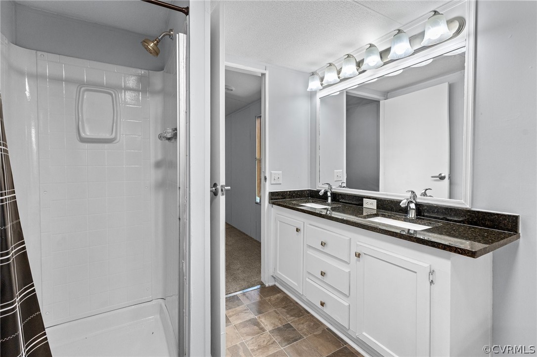 1172 Hendricks Road Pamplin, VA 23958 - Photo 22 of 36 a bathroom with a double vanity sink mirror and double