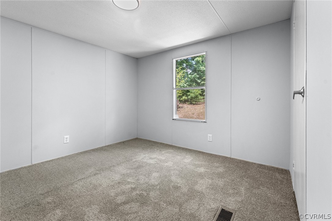 1172 Hendricks Road Pamplin, VA 23958 - Photo 26 of 36 an empty room with a window