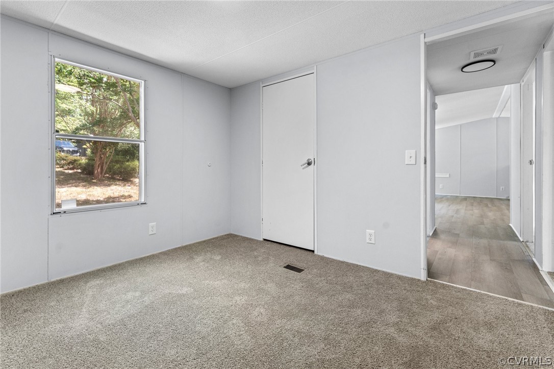 1172 Hendricks Road Pamplin, VA 23958 - Photo 27 of 36 an empty room with windows