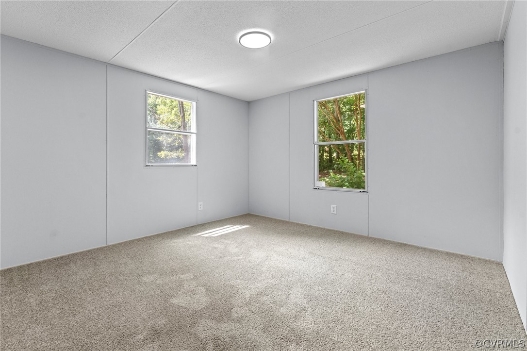 1172 Hendricks Road Pamplin, VA 23958 - Photo 28 of 36 an empty room with windows