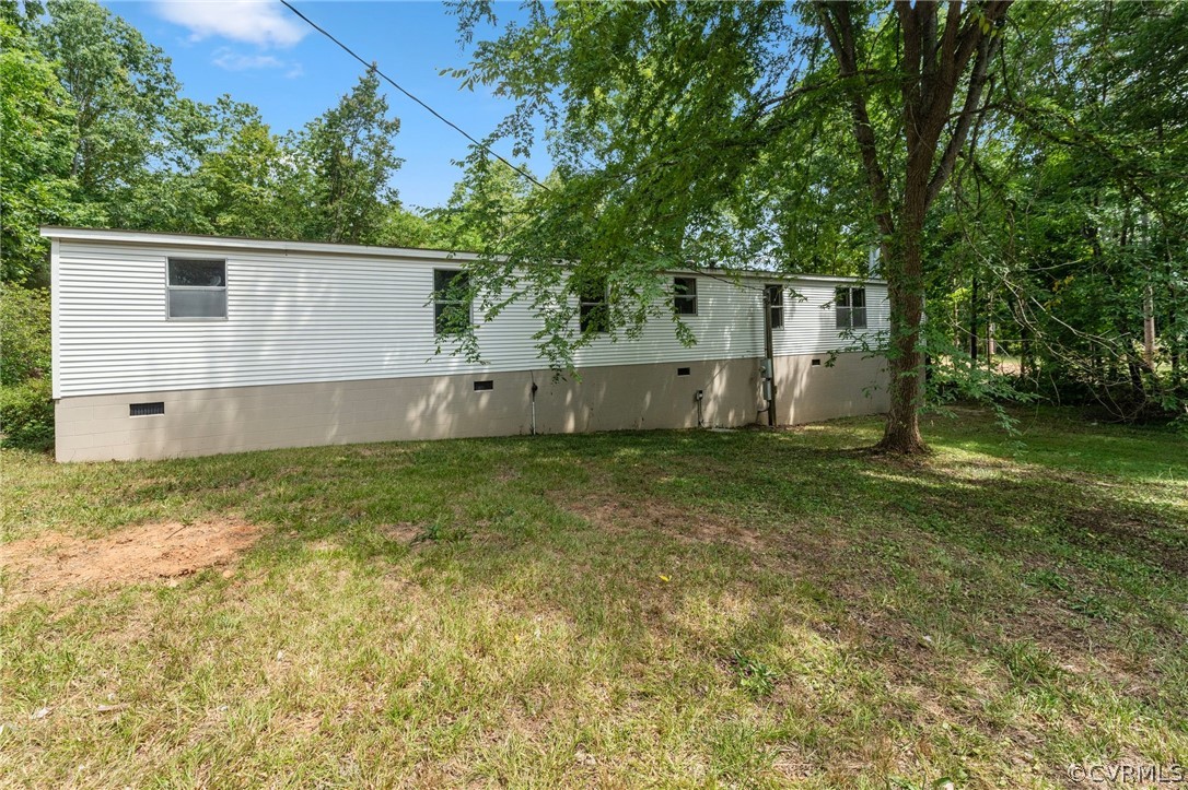 1172 Hendricks Road Pamplin, VA 23958 - Photo 33 of 36 front view of a house with a yard