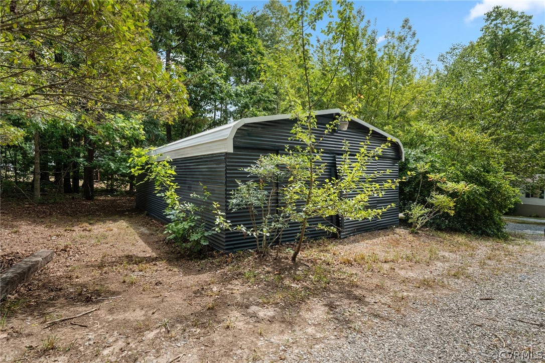 1172 Hendricks Road Pamplin, VA 23958 - Photo 35 of 36 a backyard of a house with lots of green space