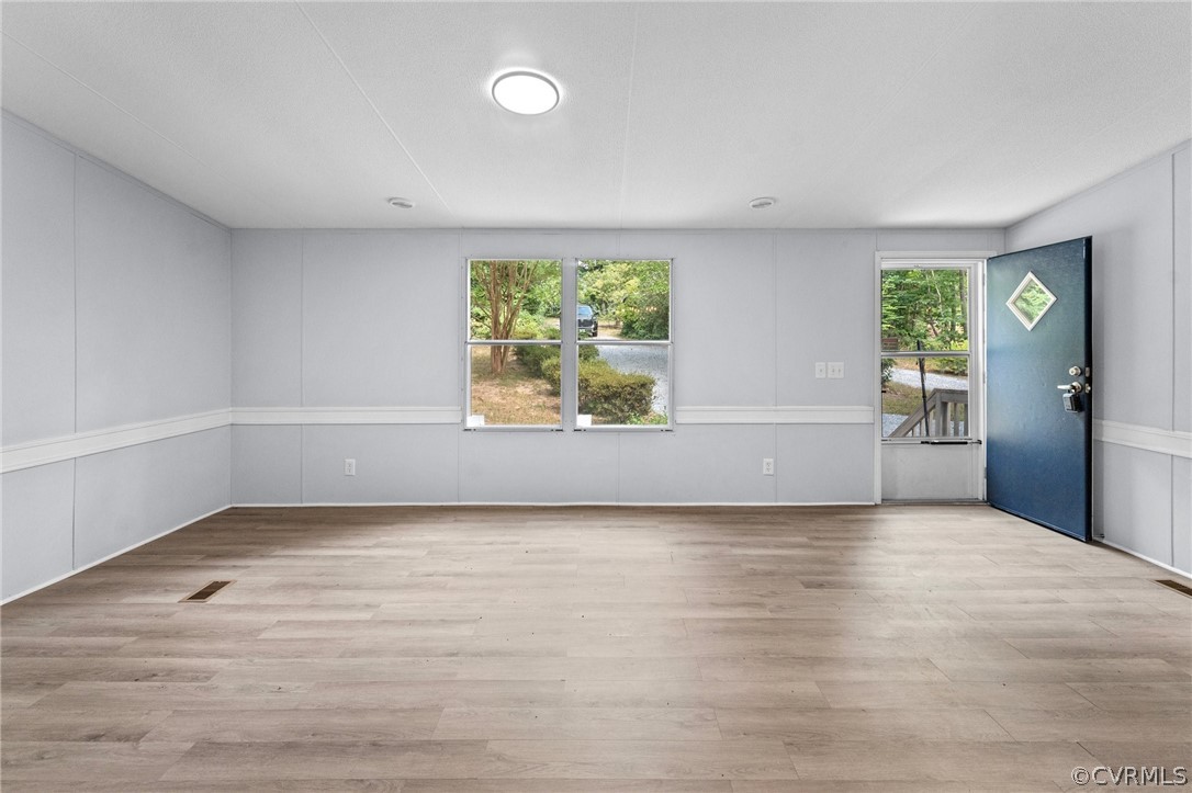 1172 Hendricks Road Pamplin, VA 23958 - Photo 6 of 36 an empty room with windows