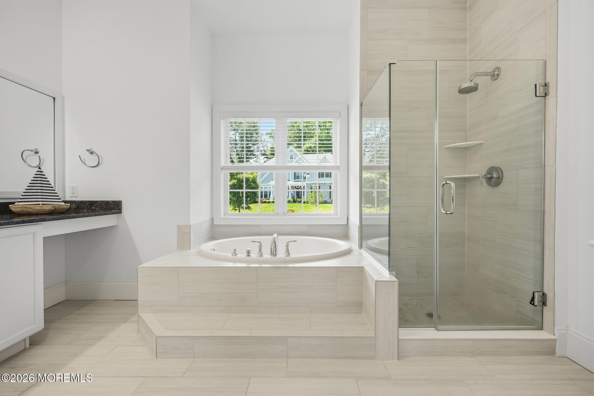 66 Windermere Road Lincroft, NJ 07738 - Photo 32 of 48 a bathroom with a tub sink shower and mirror