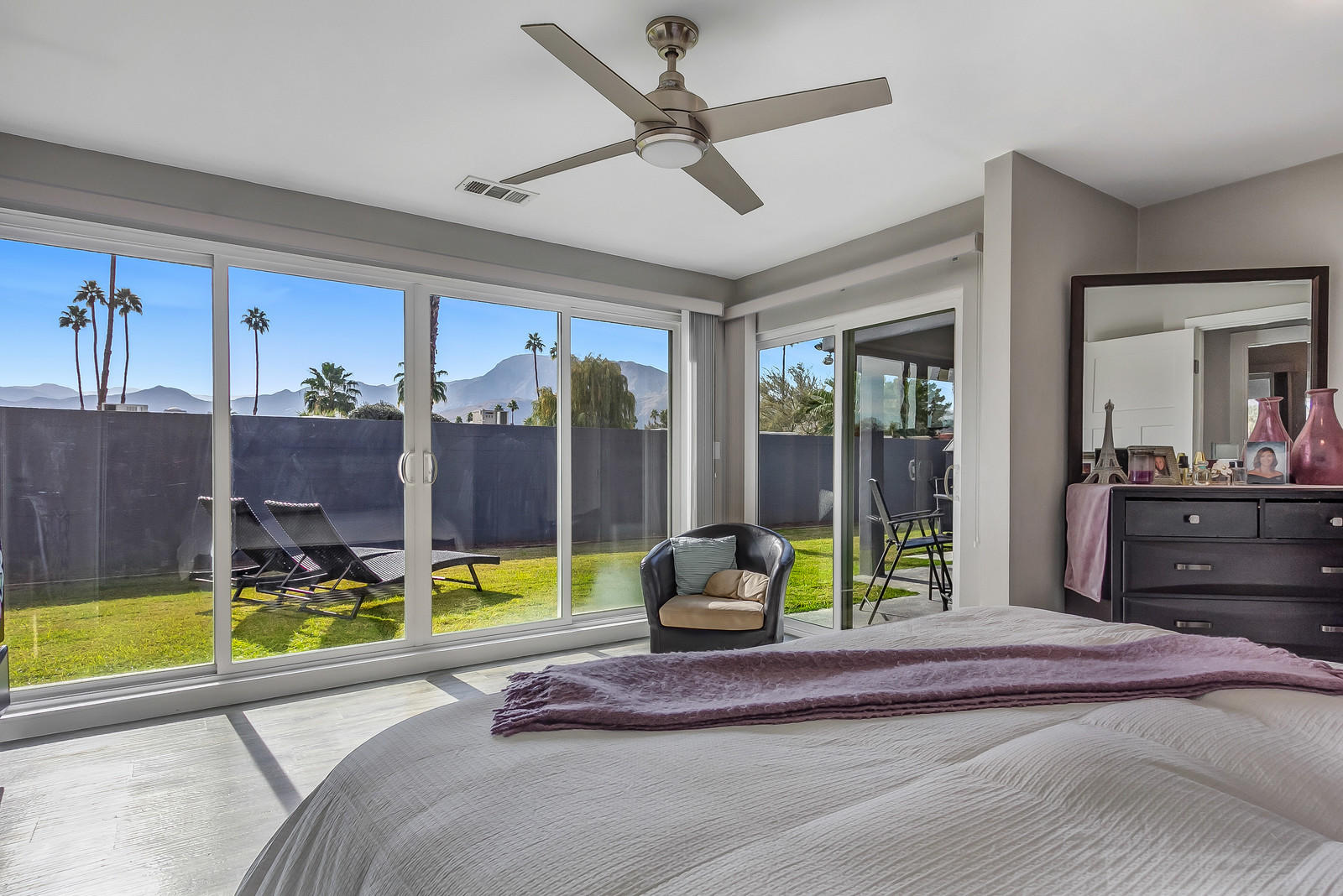 70061 Chappel Road Rancho Mirage, CA 92270 - Photo 12 of 26 a bedroom with furniture and large windows
