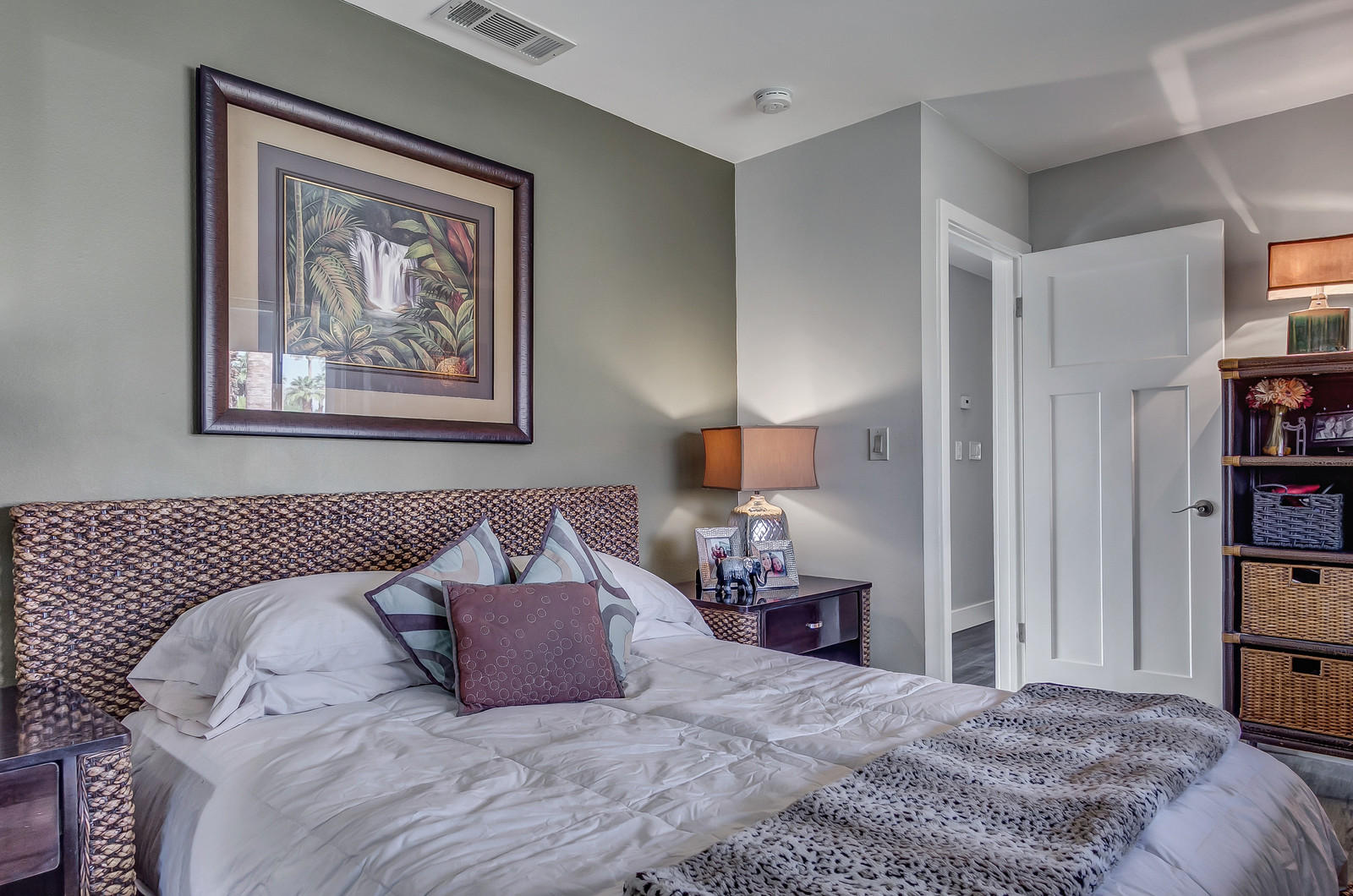 70061 Chappel Road Rancho Mirage, CA 92270 - Photo 16 of 26 a bedroom with a bed and a painting on the wall