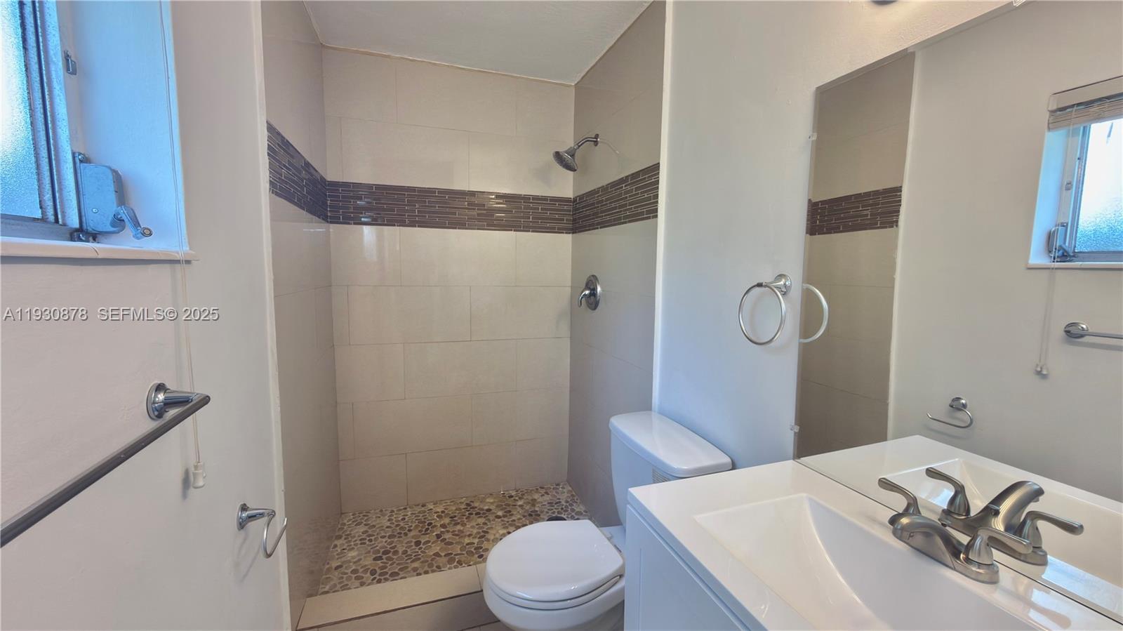 6504 Arbor Drive, Unit 6504 Miramar, FL 33023 - Photo 11 of 31 a bathroom with a sink toilet and shower