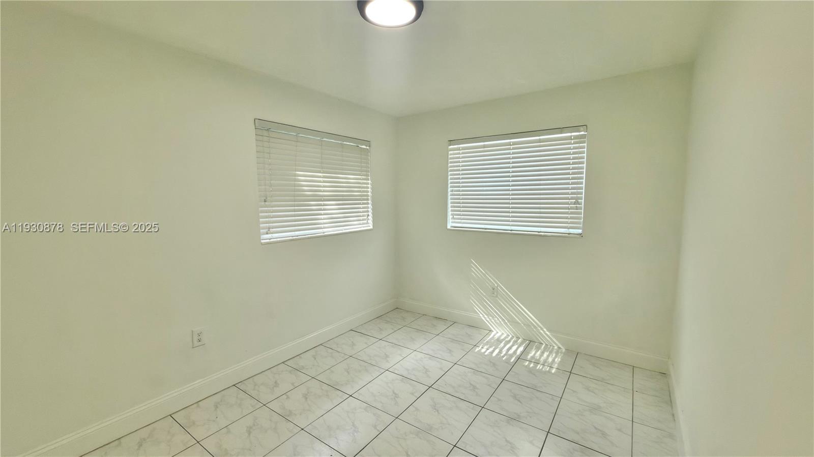 6504 Arbor Drive, Unit 6504 Miramar, FL 33023 - Photo 15 of 31 a view of an empty room with window