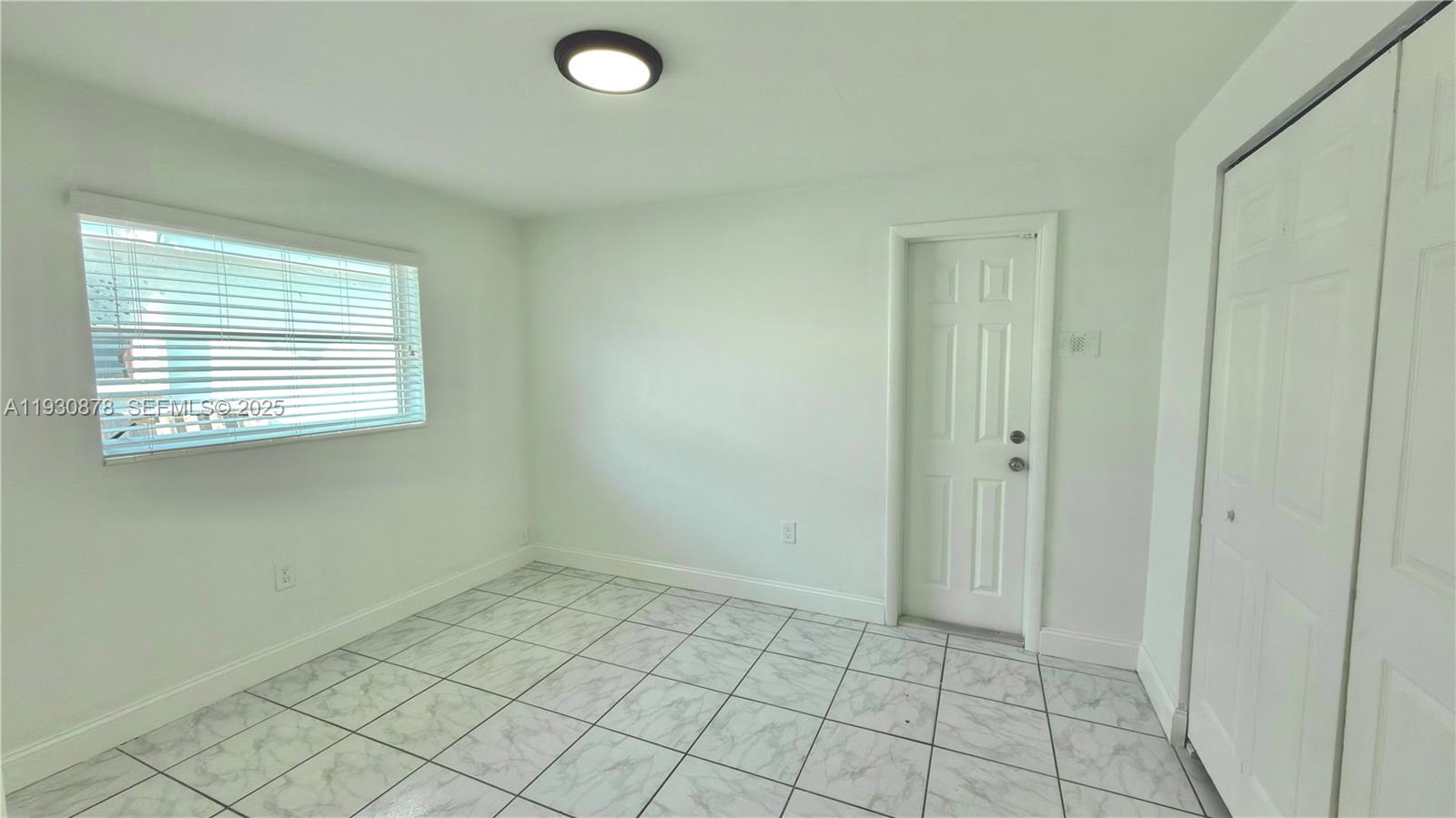 6504 Arbor Drive, Unit 6504 Miramar, FL 33023 - Photo 20 of 31 a view of an empty room and window