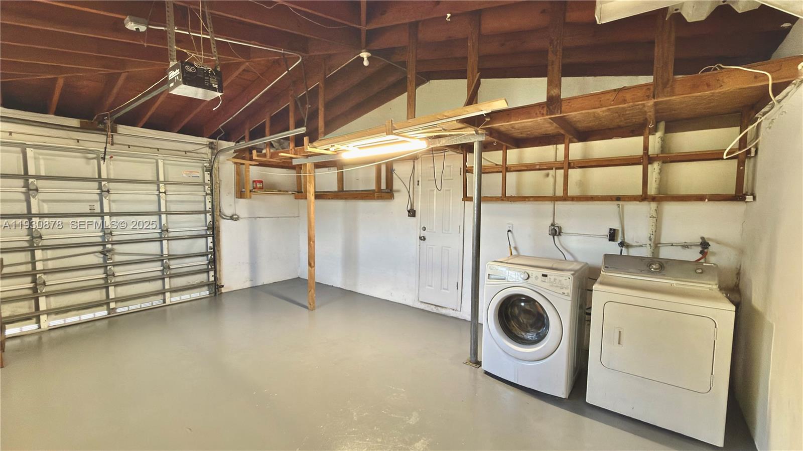 6504 Arbor Drive, Unit 6504 Miramar, FL 33023 - Photo 22 of 31 a utility room with dryer and washer