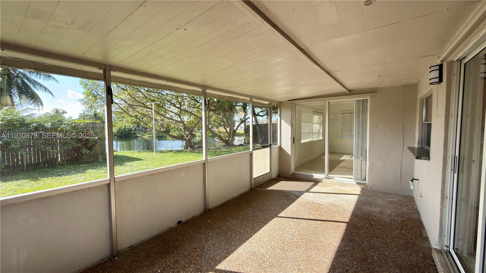 6504 Arbor Drive, Unit 6504 Miramar, FL 33023 - Photo 25 of 31 a view of a large room with wooden floor and windows