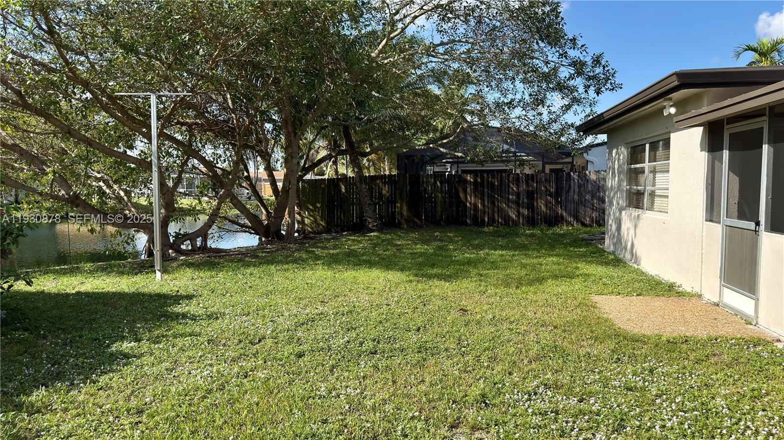 6504 Arbor Drive, Unit 6504 Miramar, FL 33023 - Photo 26 of 31 a view of a back yard of the house