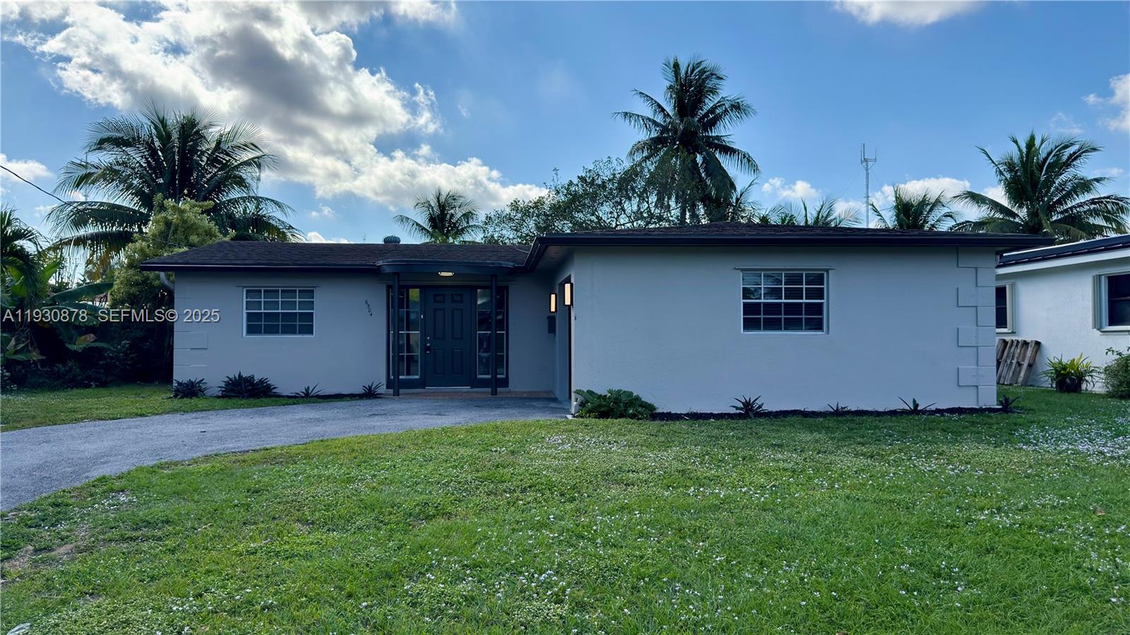 6504 Arbor Drive, Unit 6504 Miramar, FL 33023 - Photo 31 of 31 a front view of a house with garden