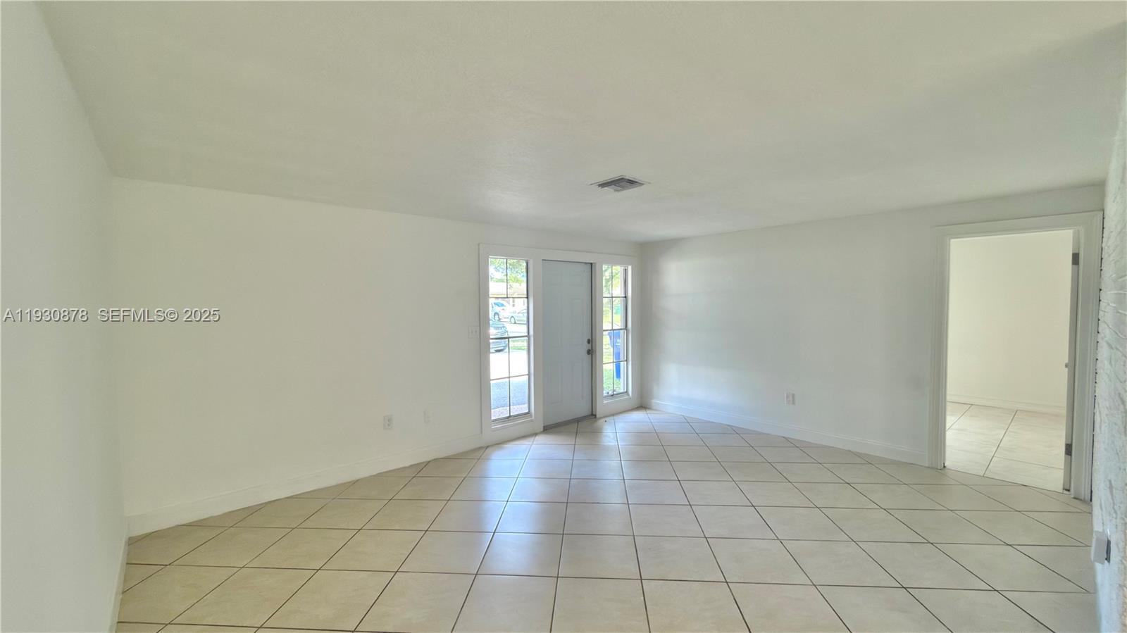 6504 Arbor Drive, Unit 6504 Miramar, FL 33023 - Photo 6 of 31 a view of an empty room and window