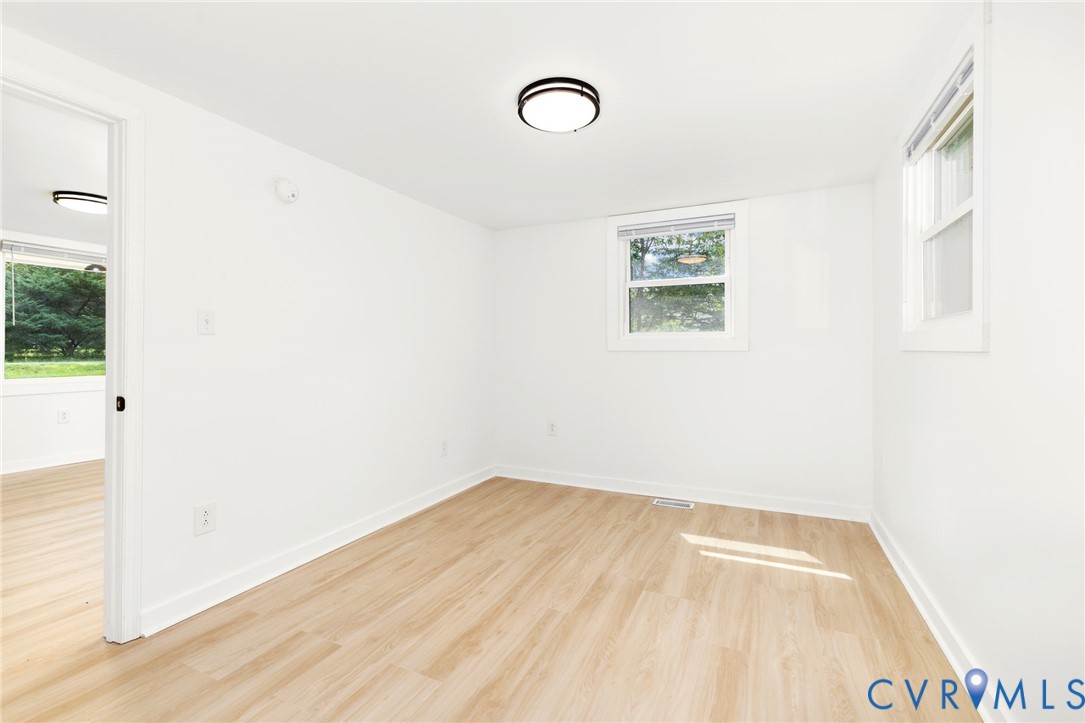 27523 Flank Road Petersburg, VA 23805 - Photo 20 of 34 Bright room featuring light wood-finish flooring,