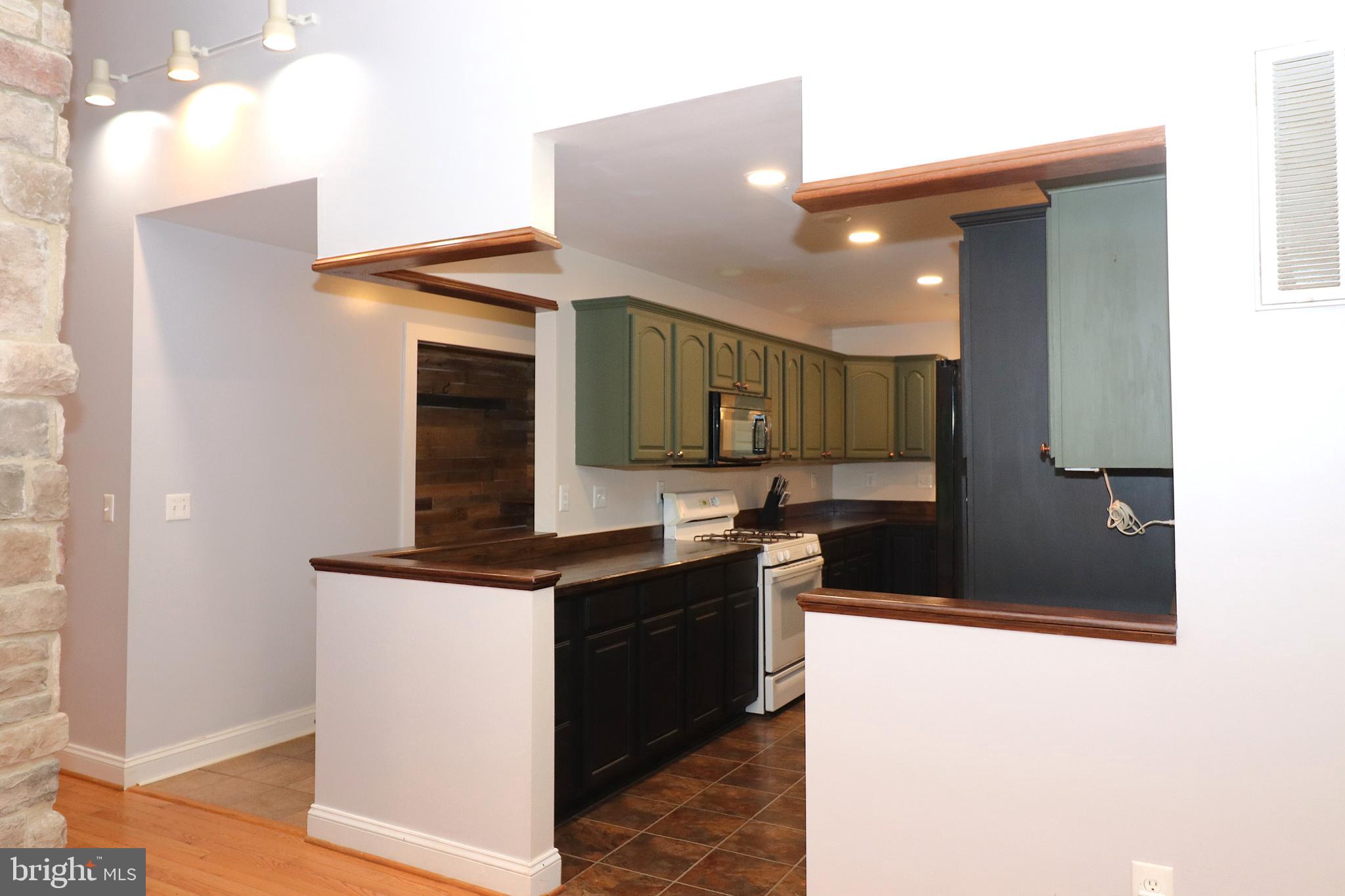 1111 Eastover Parkway Locust Grove, VA 22508 - Photo 13 of 62 a bathroom with a sink and a mirror