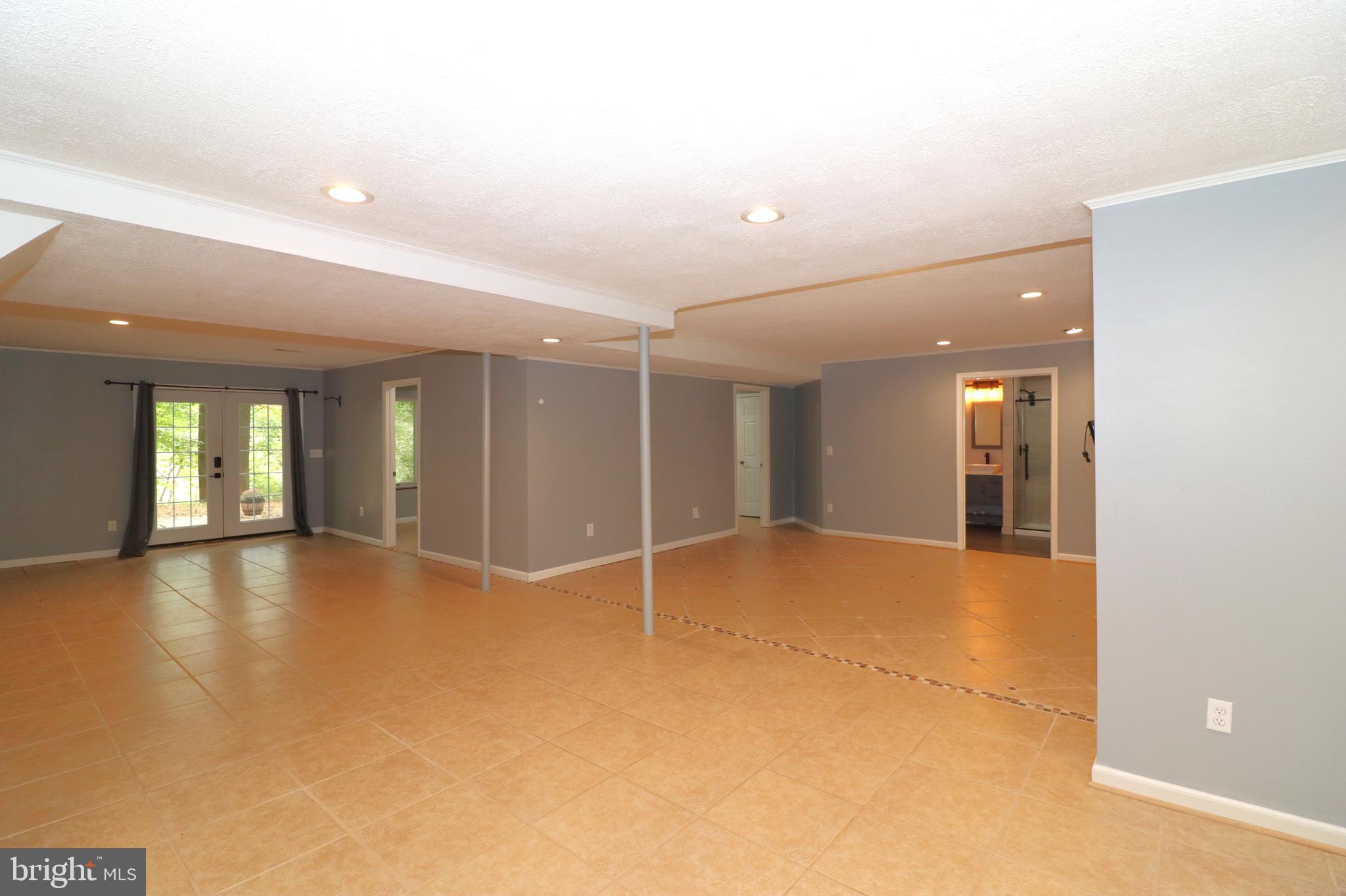 1111 Eastover Parkway Locust Grove, VA 22508 - Photo 34 of 62 a view of an empty room with window and wooden floor