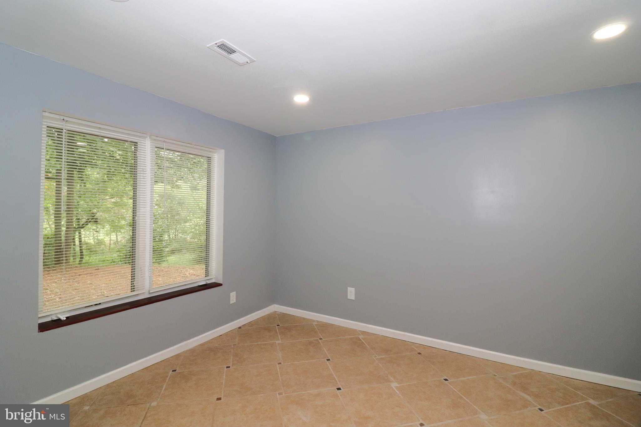 1111 Eastover Parkway Locust Grove, VA 22508 - Photo 37 of 62 an empty room with a window