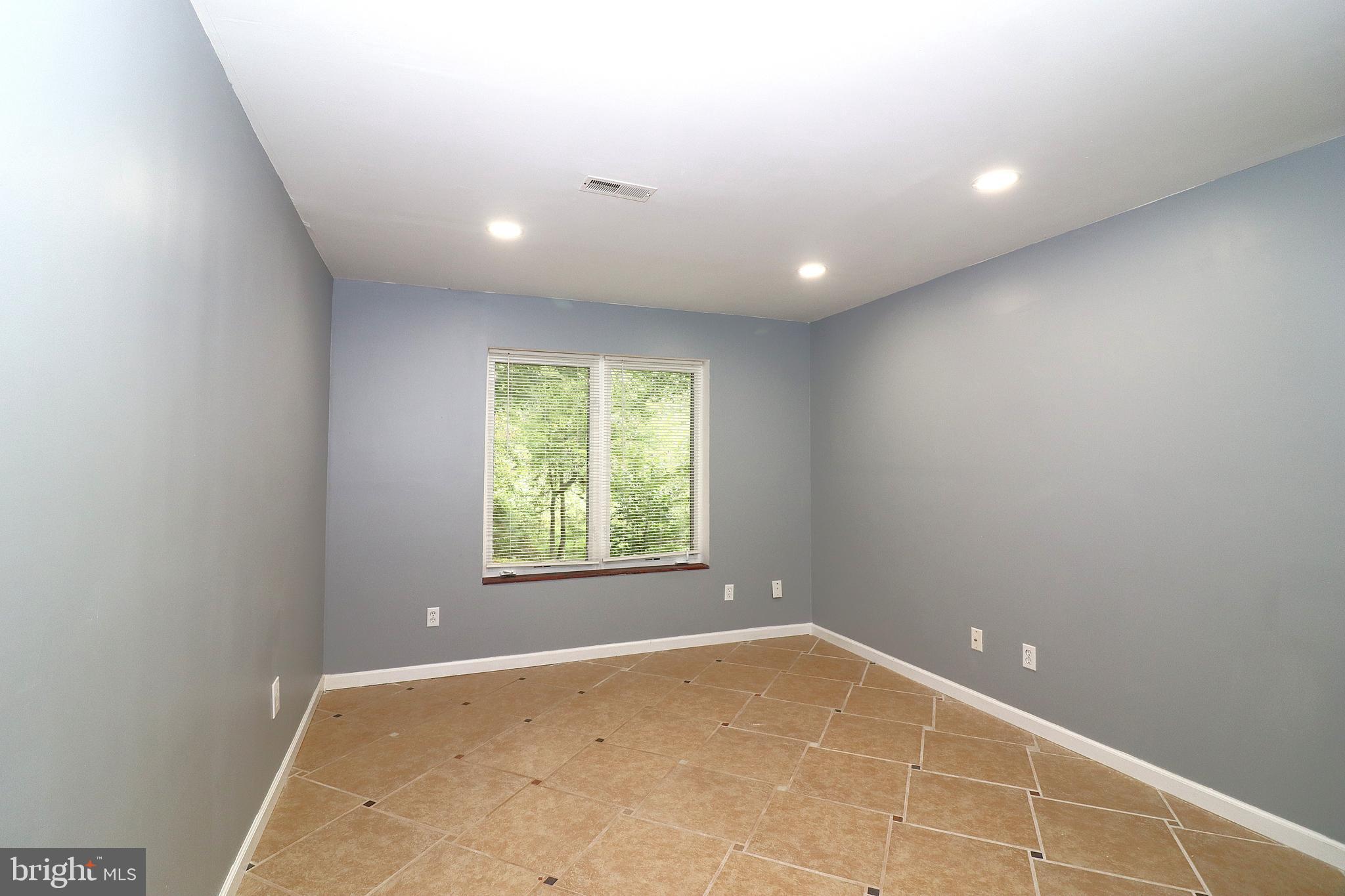 1111 Eastover Parkway Locust Grove, VA 22508 - Photo 41 of 62 an empty room with windows
