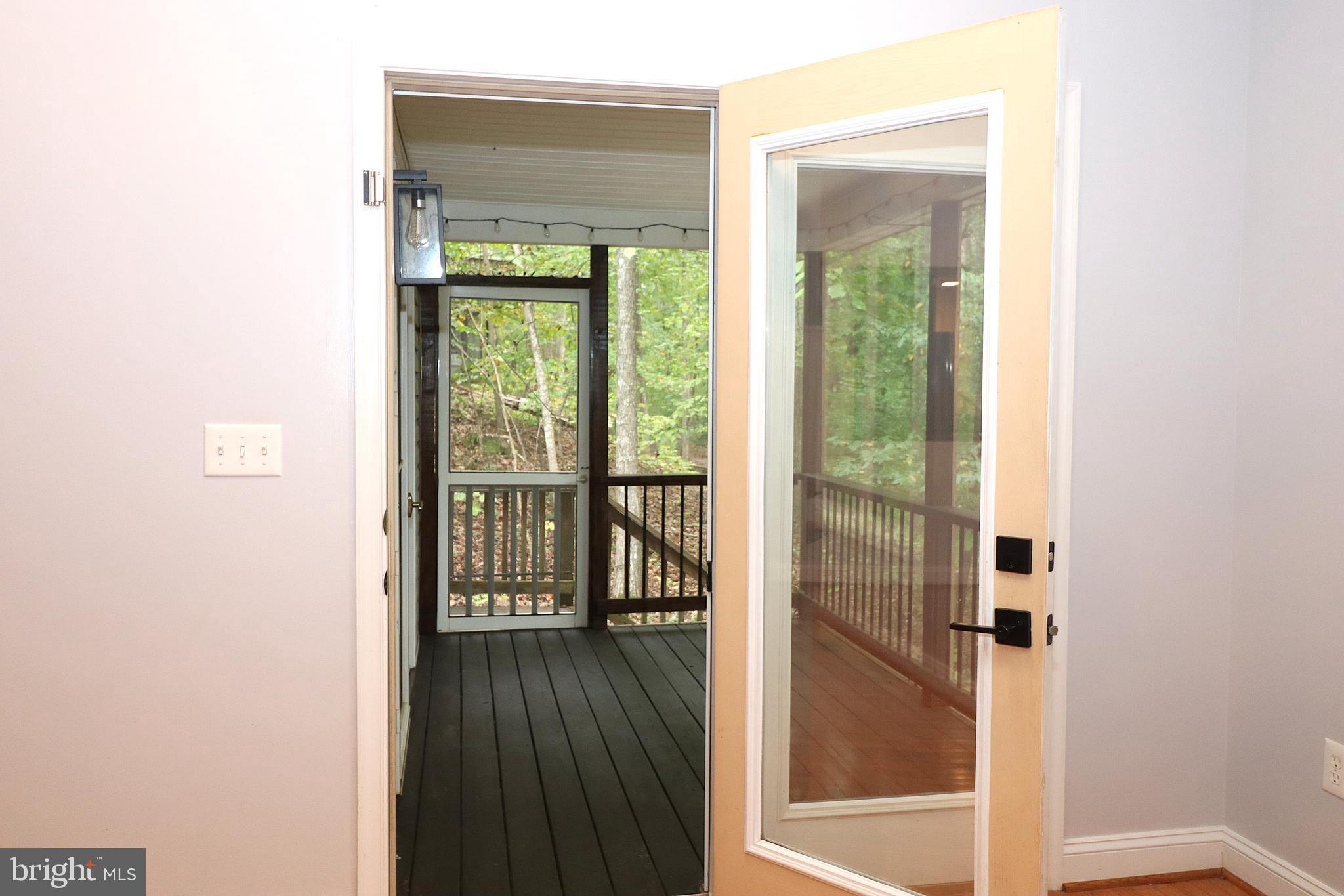 1111 Eastover Parkway Locust Grove, VA 22508 - Photo 9 of 62 a view of a bathroom from a hallway