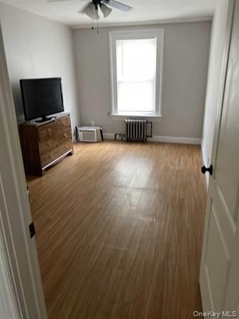 1029 Beekman Road, Unit 4 Hopewell Junction, NY 12533 - Photo 3 of 9 wooden floor and window in a room