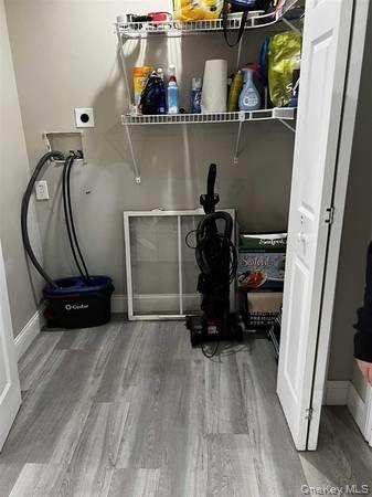 1029 Beekman Road, Unit 4 Hopewell Junction, NY 12533 - Photo 8 of 9 a view of a room with rack and bicycle