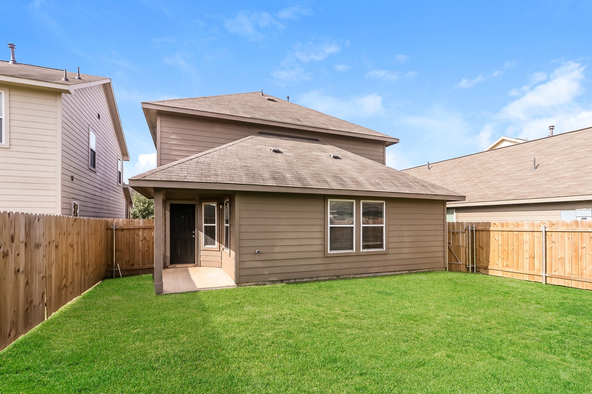 19006 Treviso Terrace Lane Katy, TX 77449 - Photo 3 of 17 a front view of a house with a garden