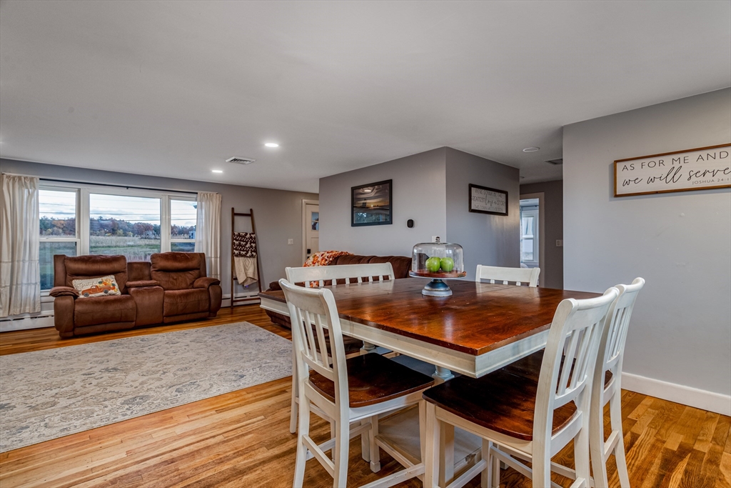 319 Chase Road Lunenburg, MA 01462 - Photo 15 of 26 a view of a dining room with furniture