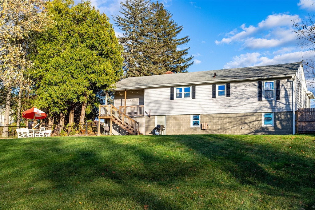 319 Chase Road Lunenburg, MA 01462 - Photo 26 of 26 a view of a house with a backyard