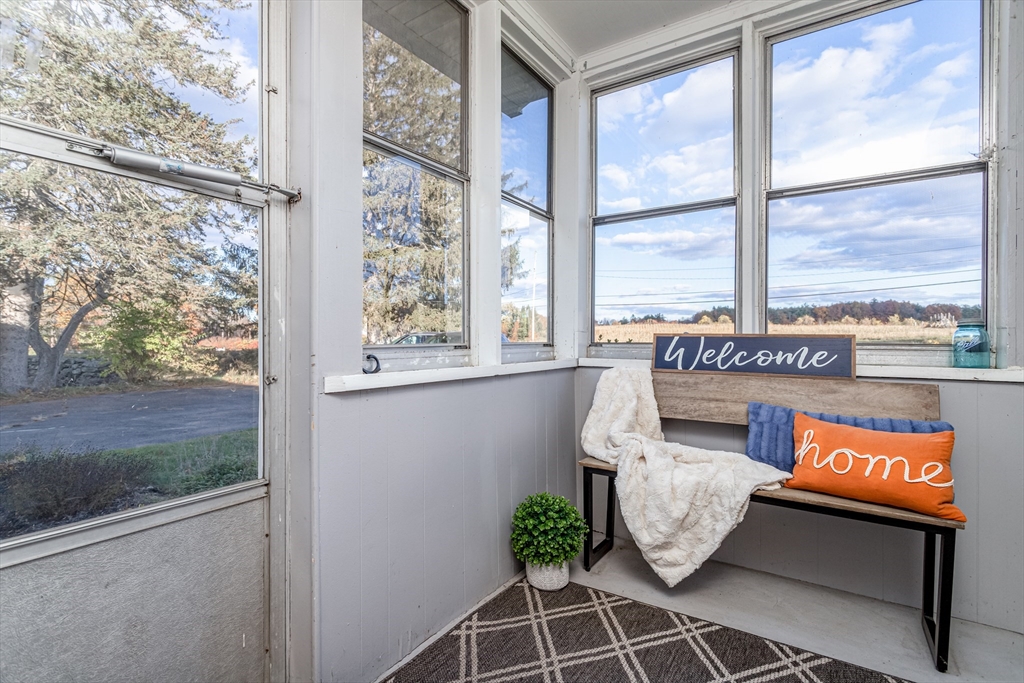 319 Chase Road Lunenburg, MA 01462 - Photo 5 of 26 a outdoor view with a sitting space